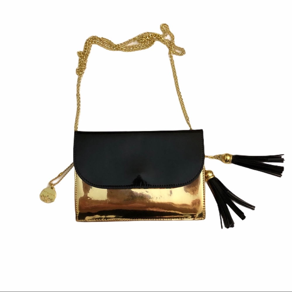 Big Buddha crossbody clutch in gold and black